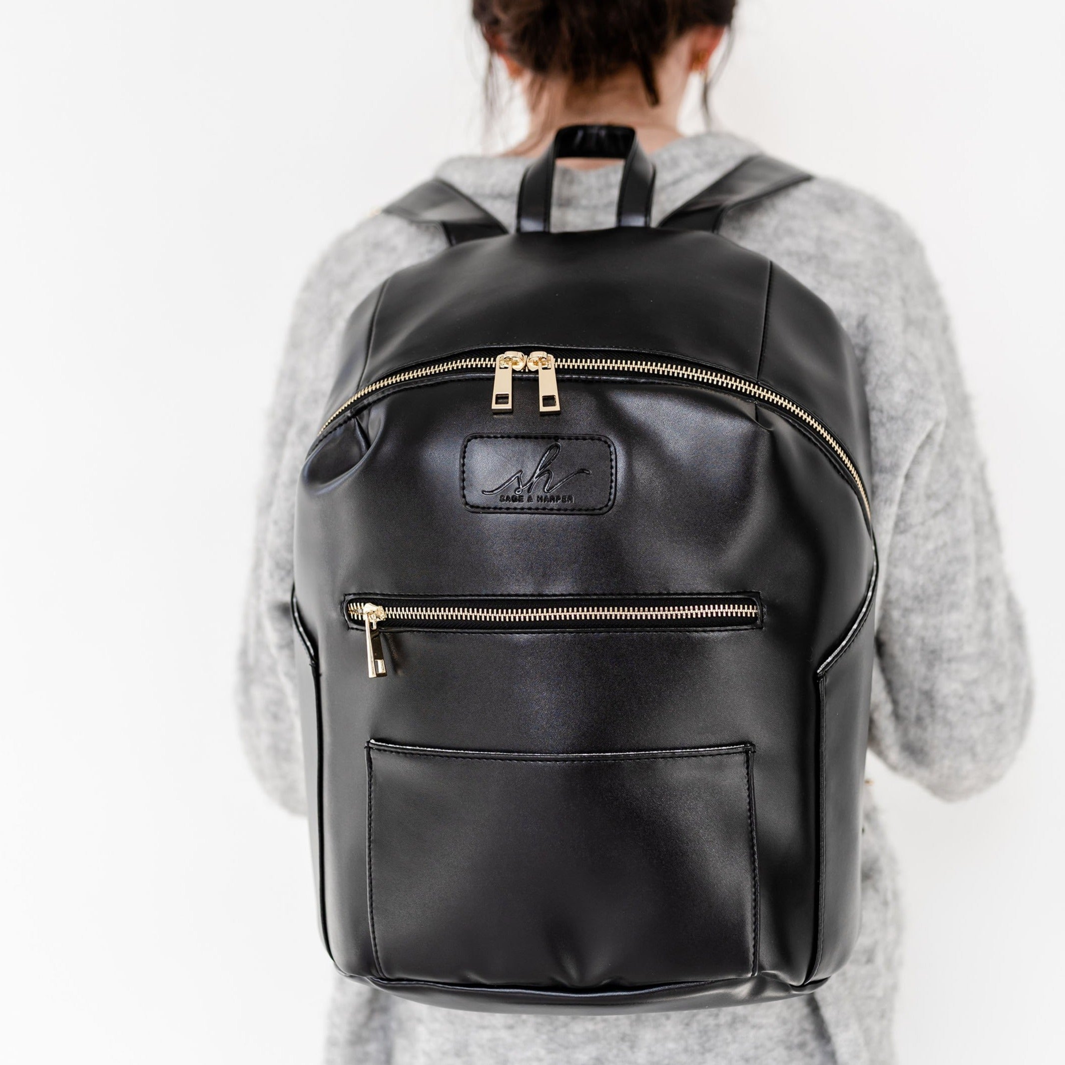 The Vallejo Multi Function Checkered Vegan Leather Backpack in Black